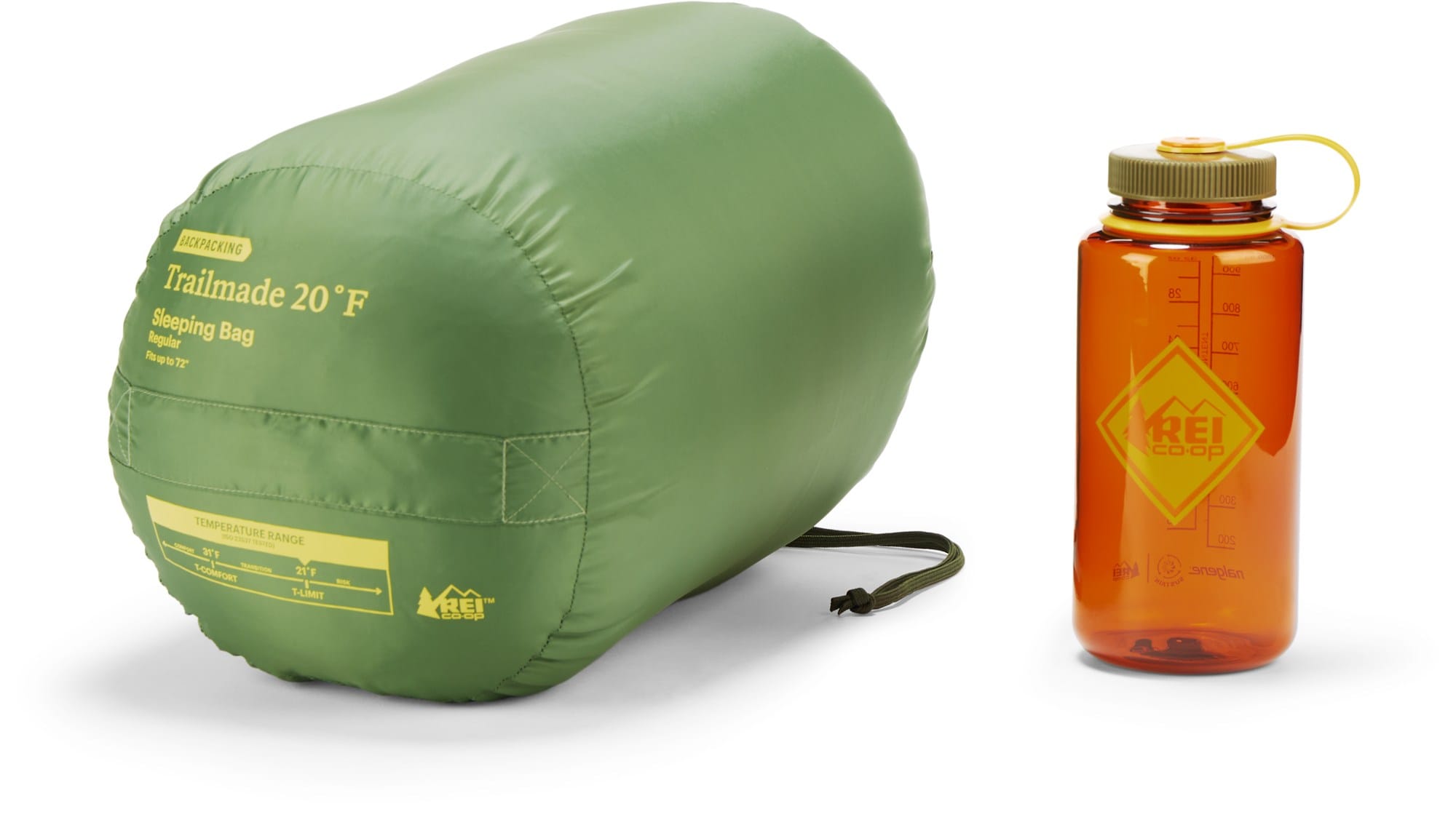 A green sleeping bag in its stuff sack next to an orange water bottle. Both have REI branding.